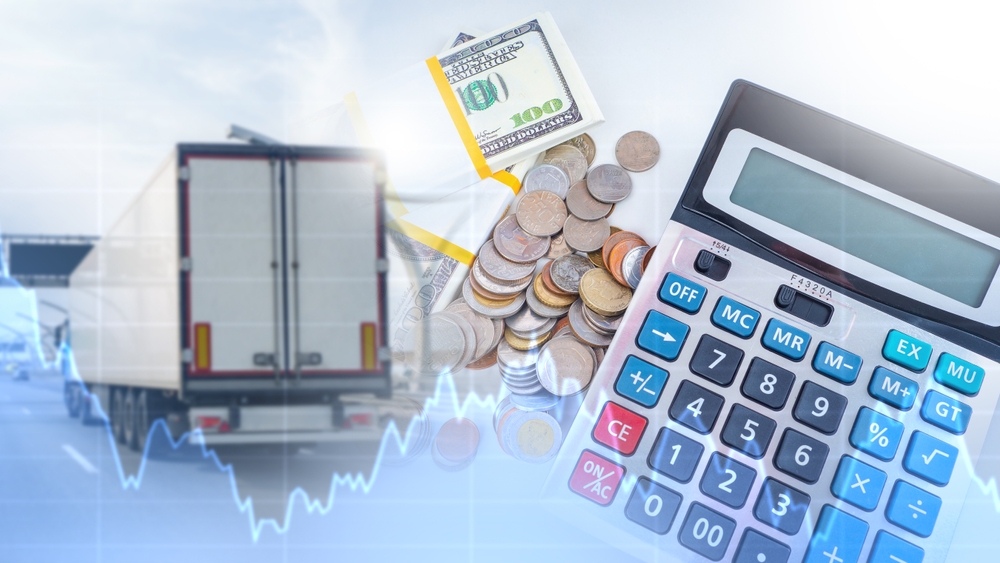 Financial management for trucking tax illustrated with truck, money, and calculator